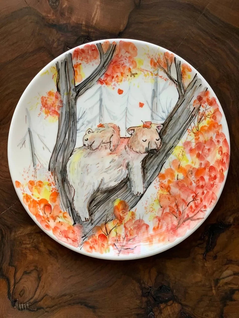 Ceramic wall decor plate, 27cm, with a unique illustration of a bear resting by a tree