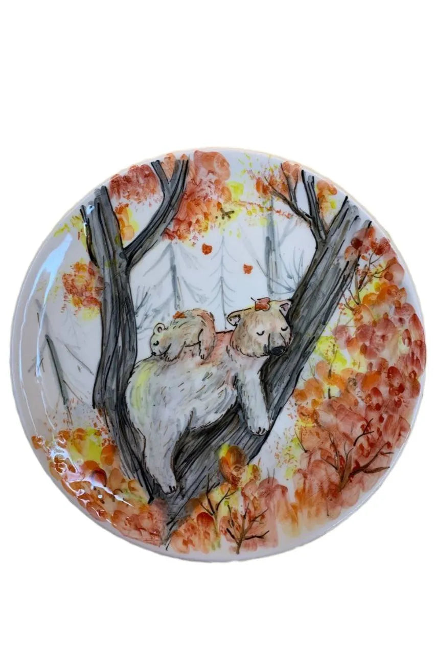 Handmade 27cm ceramic plate with handpainted sleeping bear and tree design for wall decor